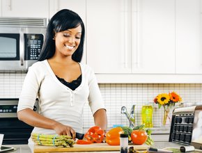 Woman using Linc to prepare food
